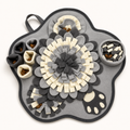 The Calm-Down Mat in Stone, paw-shaped snuffle mat